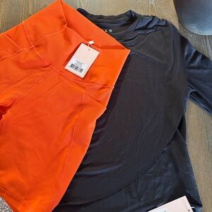 ALO Black Top and Orange Leggings Set
